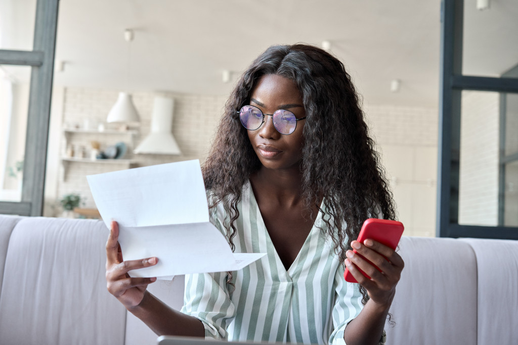 woman looking at expenses