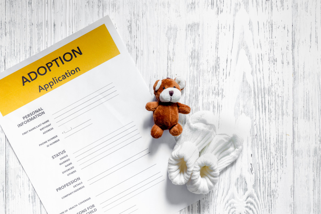 adoption application with bear toy