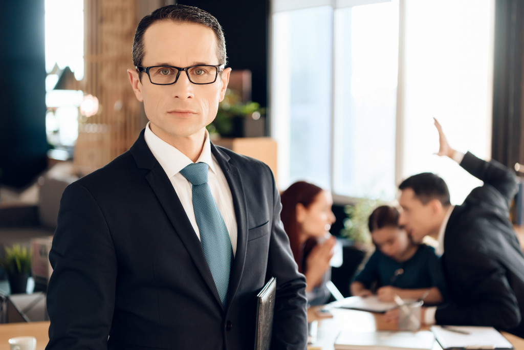 man in suit looking at camera