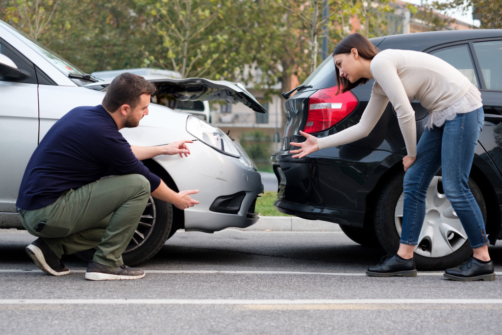 Two people arguing in a crash