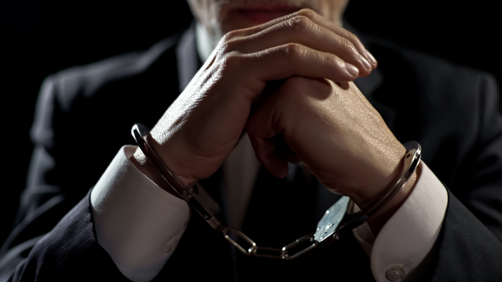 man with handcuff